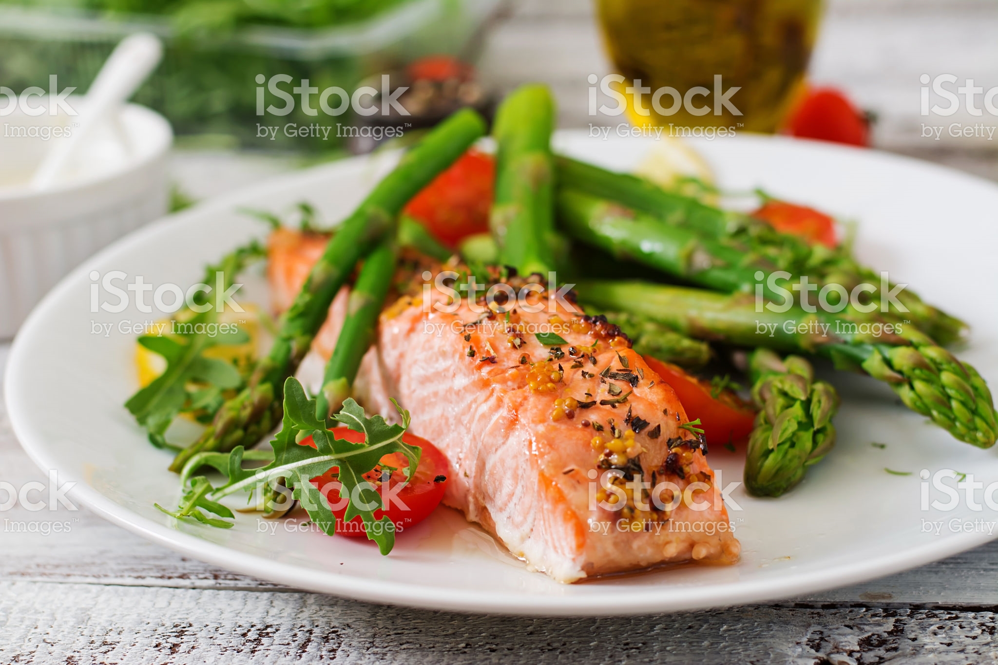 Baked salmon garnished with asparagus and tomatoes with herbs - Fran's ...